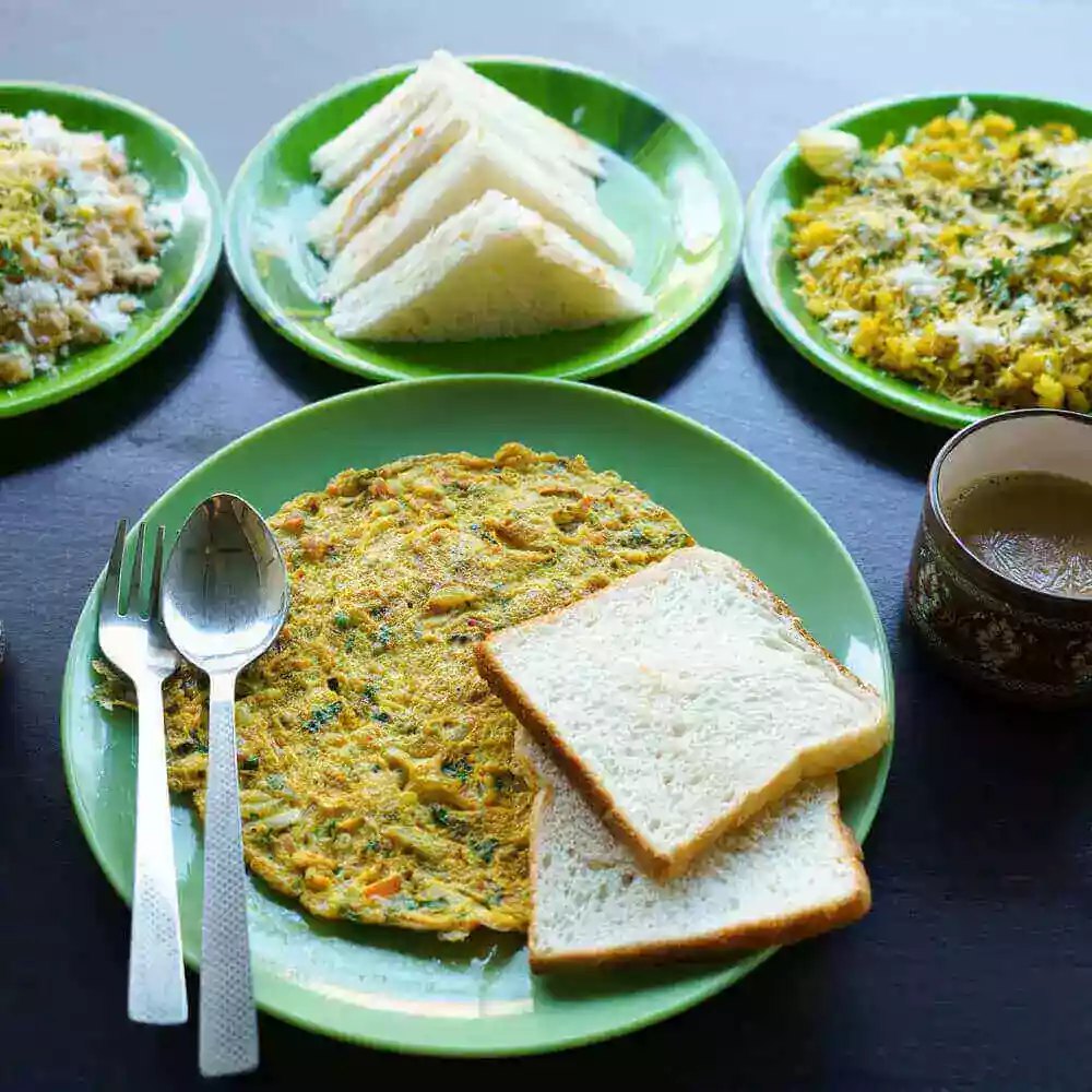 Sachu's resort serving authenticated breakfast food like poha, bread omelet, bread sandwich