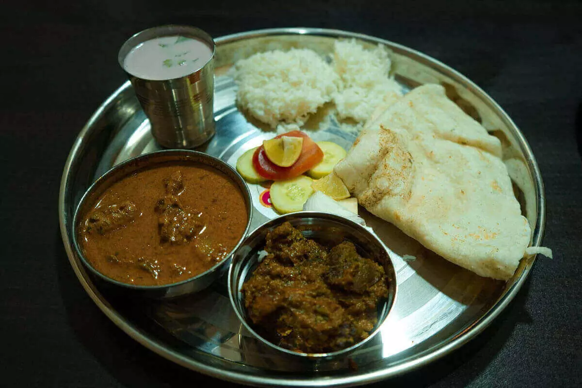 Sachu's resort serve non-veg thali which includes bhakri, bhat, two chicken discs with fabulous Solkdi and salad